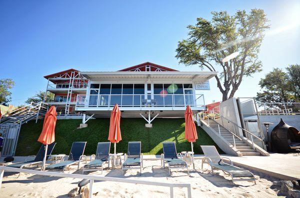 exterior view of new lakefront glass bar and beach