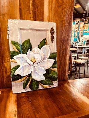 Original Magnolia painting on a salvaged door panel by Paige DeBell.