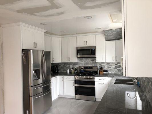 Almost finished kitchen in 3.5 weeks- Looks so modern :)-ceilings raised 23"!!!