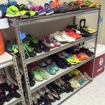 Athletic shoes of all sizes ready to help kids play.