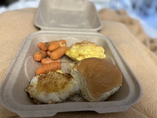 Haddock, carrots and dinner roll. Best meal in the joint.