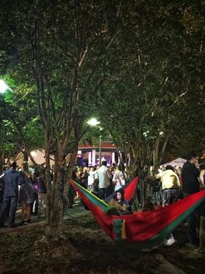 Downtown Alive Festival goers getting comfy in hammocks!