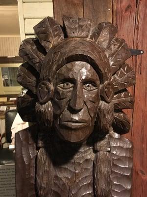 A cigar store Indian.