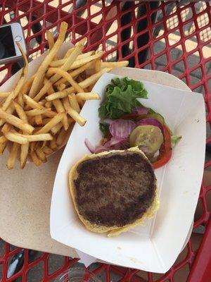 She was putting ketchup on the other half a bun before I could snap the pic!