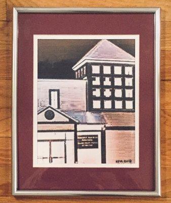 12 Images from  "Main St, EG" by Michele Keir on display in office.