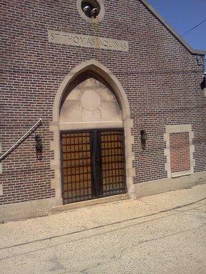 Doors in alleyway, entrance to sanctuary