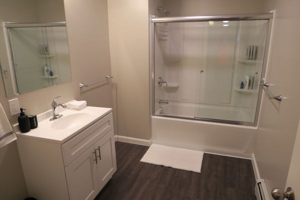 Ground-floor bathroom with new sliding glass doors!