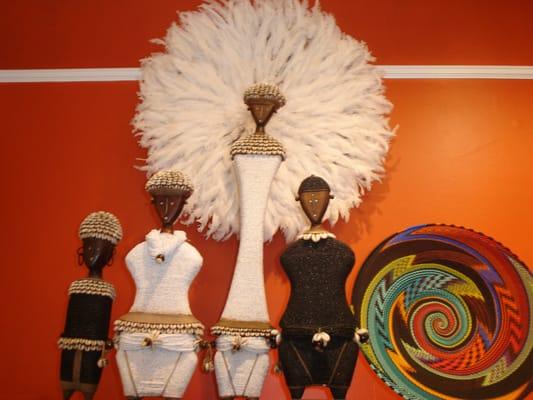 Domji dolls from Cameroon, Juju feather headdress, Zulu telephone wire platter