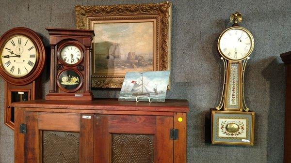 The extraordinary parlor clock (far right) I was outbid on; it sold for $450.