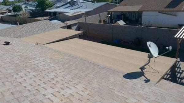 Shingle Roof with small flat deck