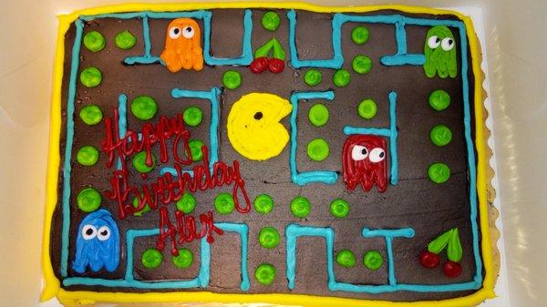 Pac-Man cake I ordered! I just asked for a cake with Pac-Man and 4 ghosts and didn't expect much, but what I got was this masterpiece!