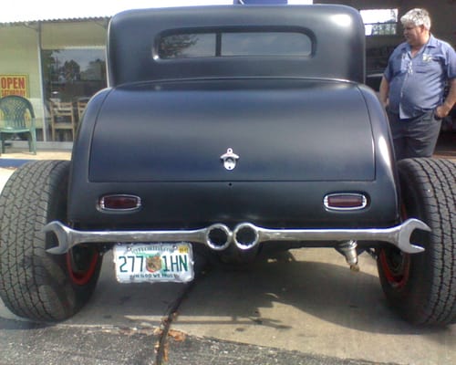 !939 Rat Rod John is standing next to it.