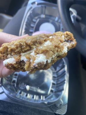 A half eaten oatmeal cookie cake