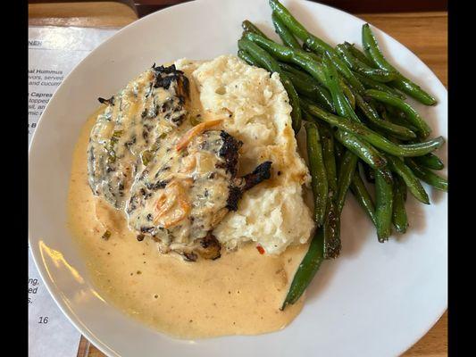 Tuscan Herb Chicken w/tomato & basil cream sauce with parmesan.