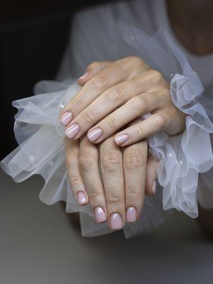 Elegant Russian manicure with a soft pink gel polish by Kate at Manicure Portland. Perfectly shaped nails and meticulously groomed cuticles