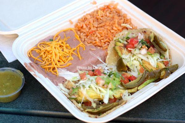 Two Avocado Tacos Combo ($10.95) - avocado, lettuce, pico, sliced jalapeño. Side of rice and beans.