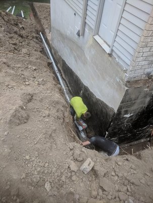 Original Foundation Waterproofing on home prior to Rite-Way's Preminum System. Notice the original builder missed grade level by a mile!