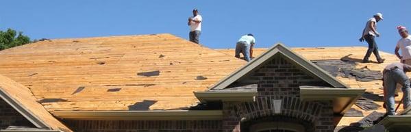 One of our crews working on a roof in the Oklahoma City metro area.