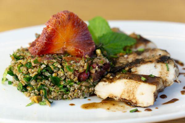 Pomegranate Glazed Chicken: Pan-seared chicken breast glazed in pomegranate
molasses and served with pomegranate tabbouleh.