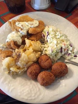 All you can eat fried catfish, coleslaw, cheesy potatoes, hushpuppies, and red beans (not pictured).