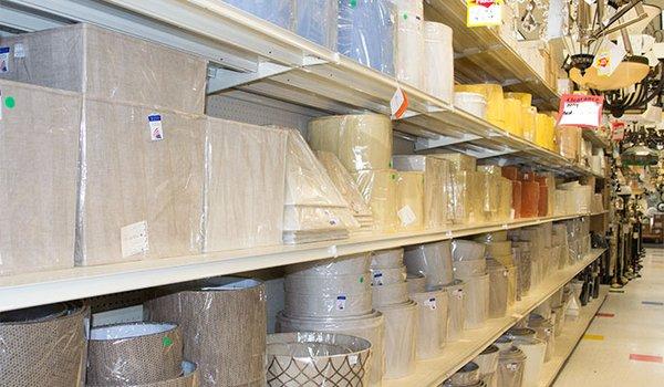 Shelves upon shelves of lamp shades. So many choices!