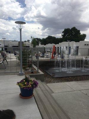 Fountain in between the motel and outdoor seating.