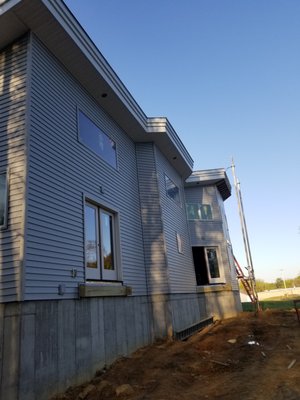 huge siding job, with some very involved faceboard and aluminum work!