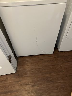 Scraped washer machine before move in