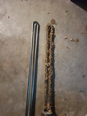 Bad heating Element next to new heating Element