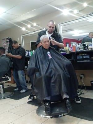 Darin, one of our barbers, in action.