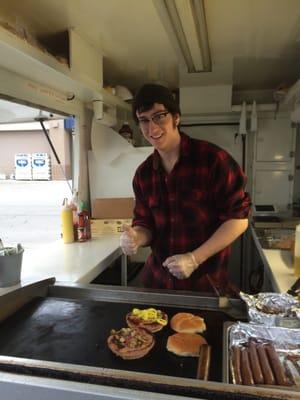 Forrest grilling us a pair of the best fried bologna sandwiches around. The fried mozzarella he puts on it is miraculous!