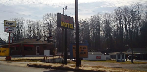 Rose Village Motel sign