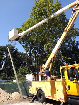 Service Pole Setting with our High Ranger Bucket Truck ... parking lot lighting of course.