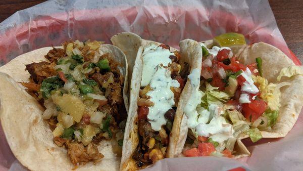 This temptingly titillating taco trio tantalized thine taste buds to the threshold. (l) Pork al Pastor, (m) Portabella, (r) Cajun Fish