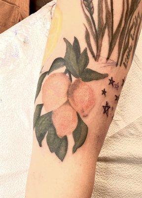 Realistic Lemons on forearm.