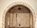 Custom arched shower tile installation