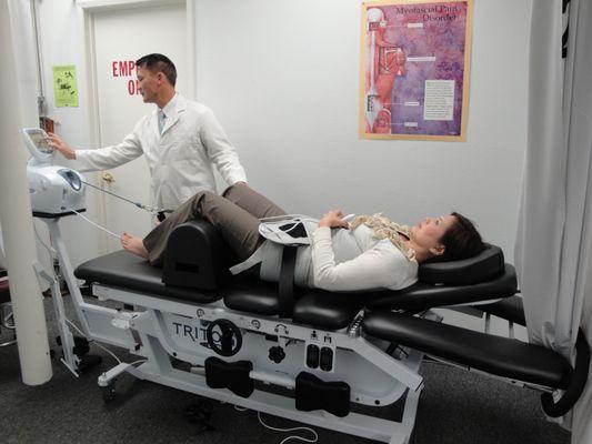 Spinal Decompression Treatment for disc bulges pinching nerve causing pain, numbness, tingling and weakness.