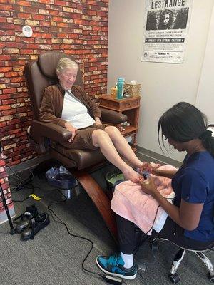 Pedicure for my mom with Gigi! Cuticle trim, exfoliating, and red gel polish!! Gigi does an amazing job.