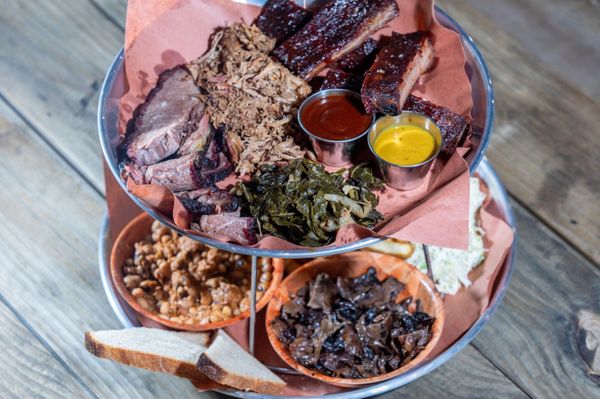 Craft Hall's Almost-Famous BBQ tower comes with your pick of 3 meats and sides