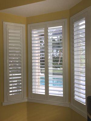 Plantation shutters for french doors. Made and installed in Port St. Lucie, FL. plantationshuttersfla.com