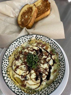 Wild mushroom ravioli with balsamic glaze and house made white wine sauce