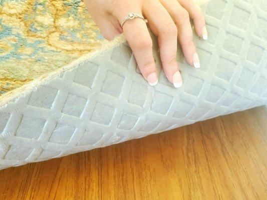 Premium rug pad w/pet urine barrier!