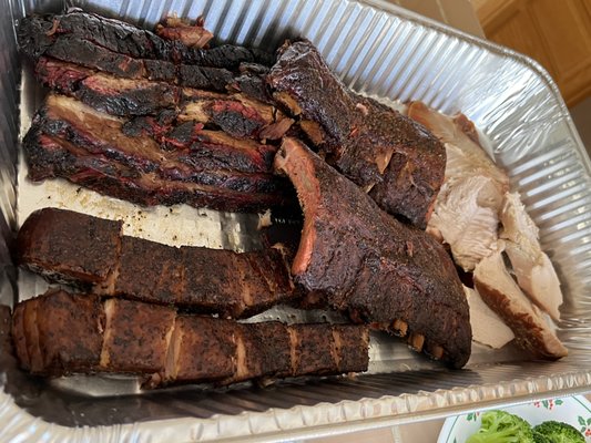 upper left CW: brisket, baby back ribs, pork belly