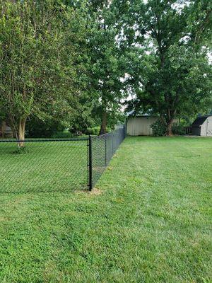 Chain link fence. inexpensive fencing solution for homes /businesses. From galvanized steel to  Colored coated vinyl we have your Solution.