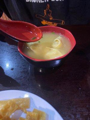 Wonton soup with hot mustard added. Yummy!!