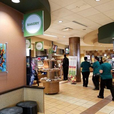 individual order stations for baked goods, deli, pizza, salad bar