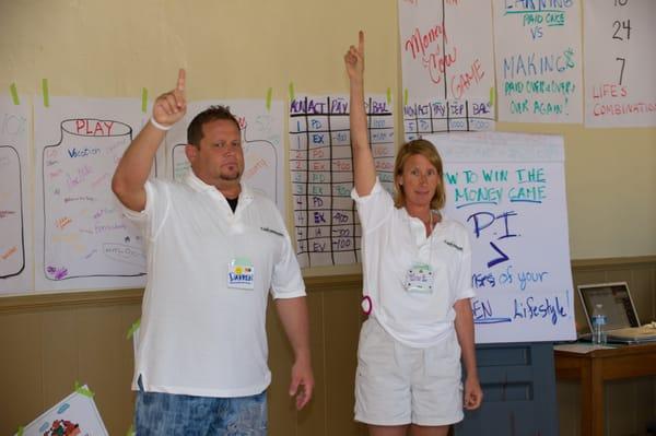 Elisabeth Donati and Darren Orshoff teaching Camp Millioanire