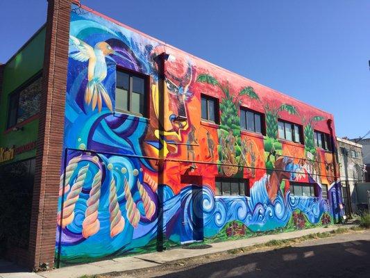 Our mural on Alcatraz Ave, designed by artists at Youth Spirit Artwork, shows images of healthy living (funded by Berkeley's soda tax fund)