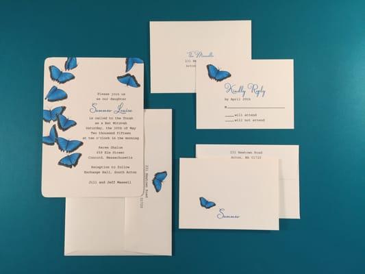 An invitation suite with custom butterflies