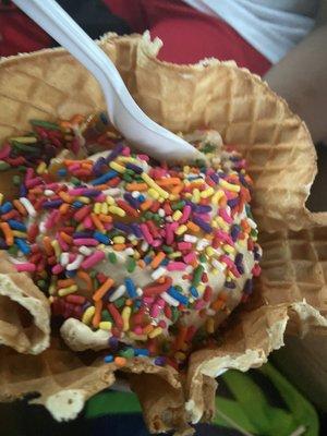 Coffee with sprinkles in a waffle bowl